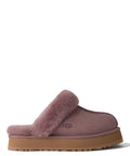 Claquettes UGG Disquette en daim et peau lainée avec semelle plateforme