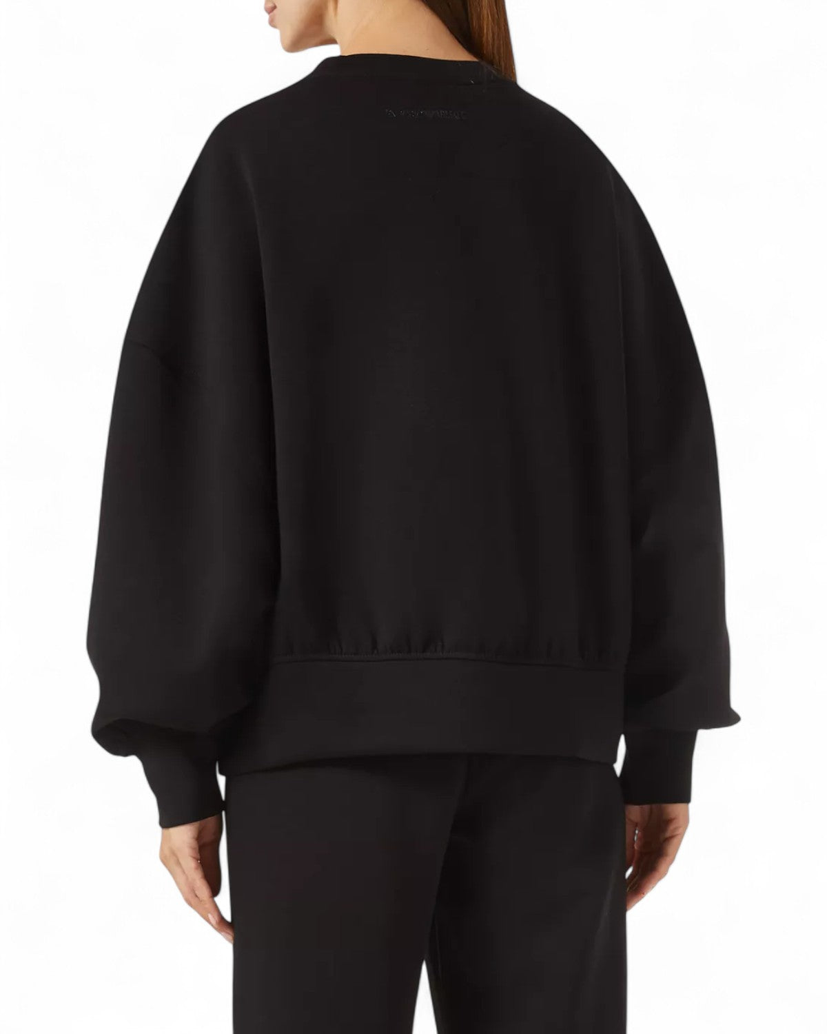 Vista posteriore della felpa in cotone Emporio Armani nera da donna, taglio comodo e design minimal per outfit versatili.