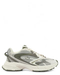 Lacoste L003 Neo Shot sneakers uomo in mesh e nabuk con suola oversize EVA, profilo laterale in bianco e verde oliva.