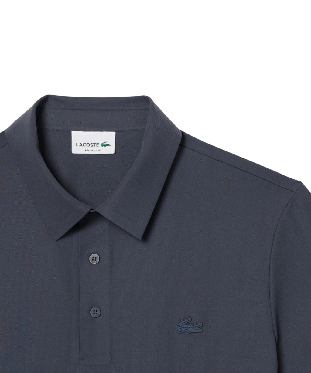 Polo Lacoste Commuter coupe droite