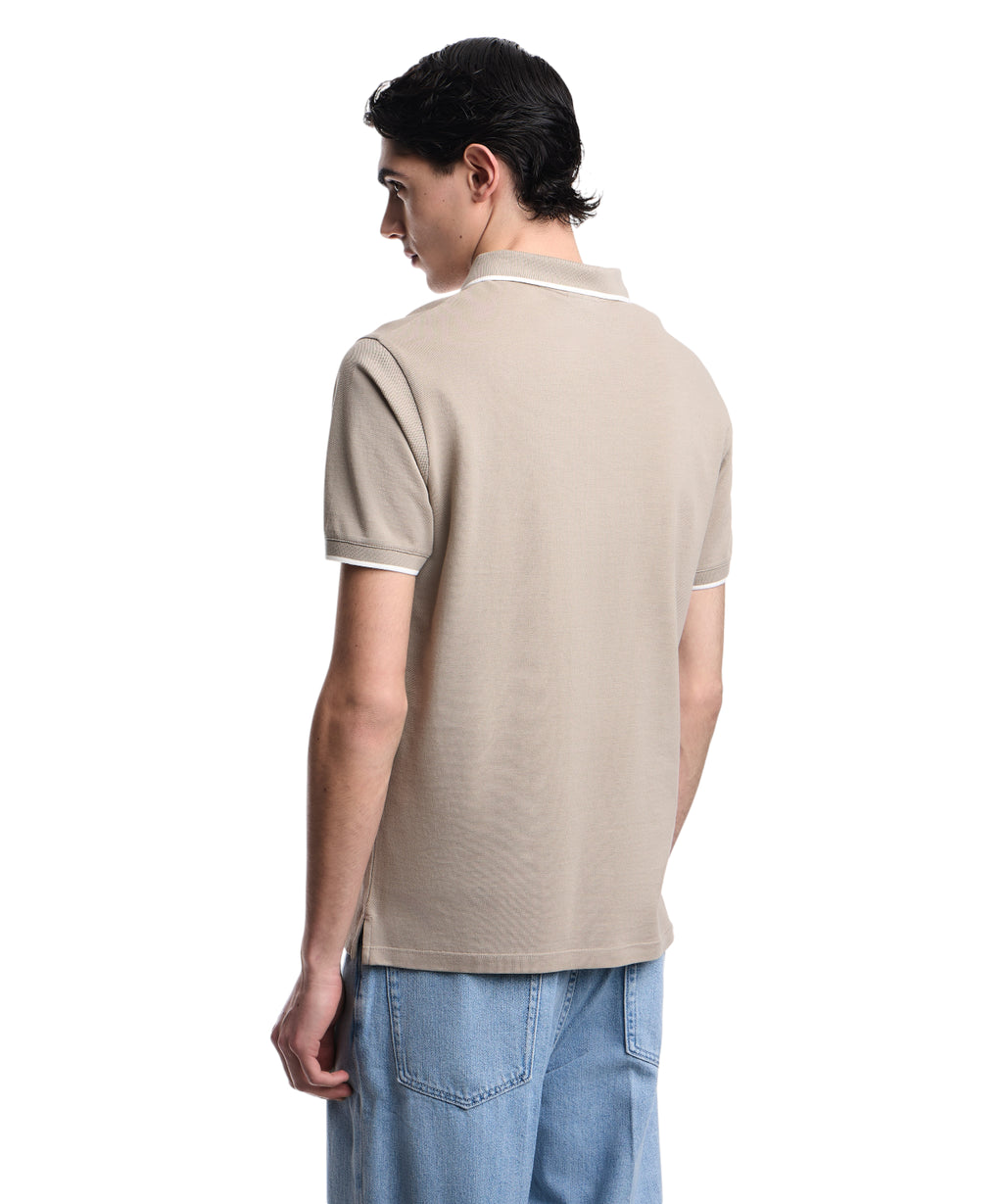 Polo homme en piqué de coton avec col en V