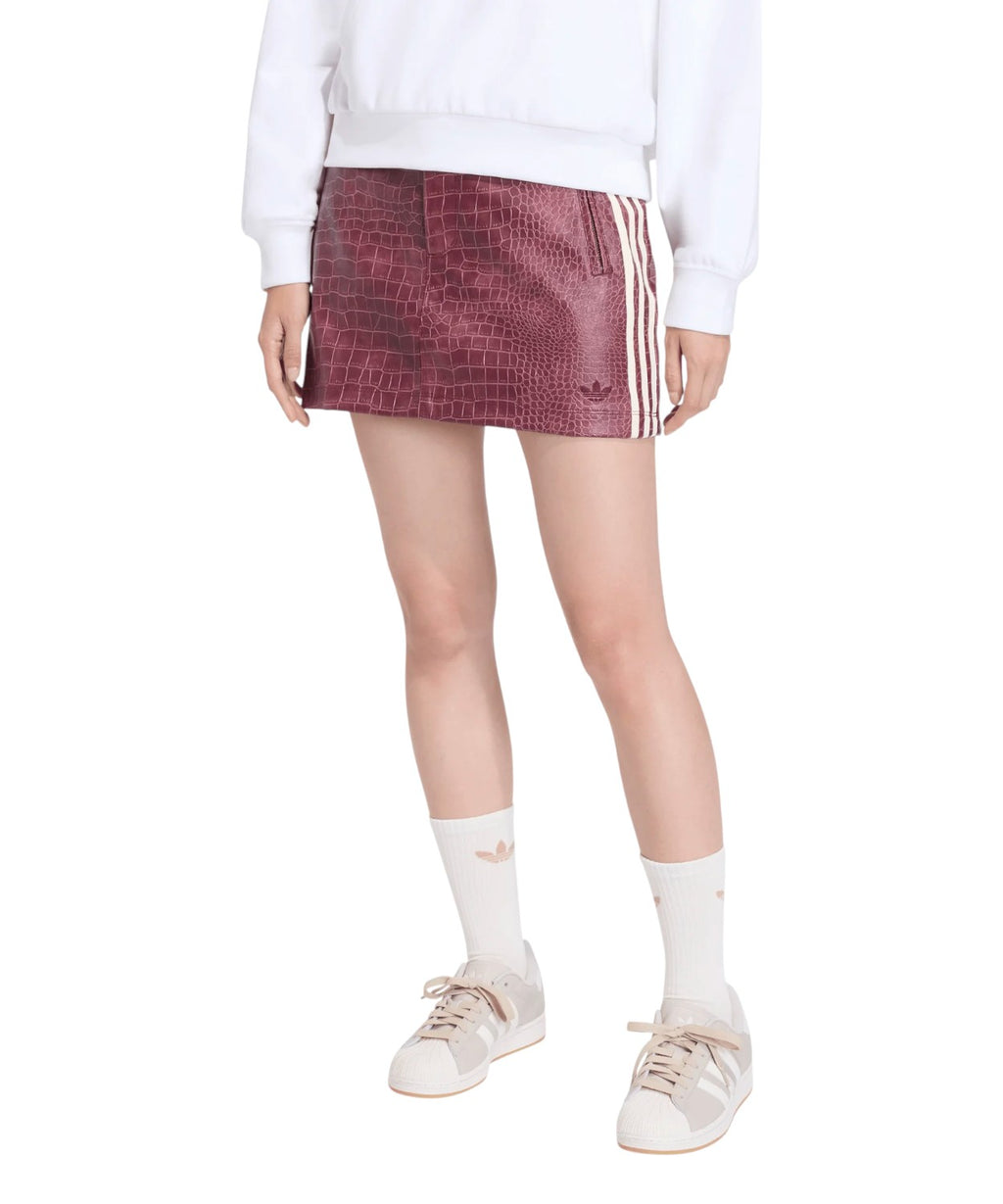 Mini-jupe en similicuir avec poches zippées en similpelle