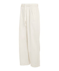Pantaloni rilassati adidas Originals in beige