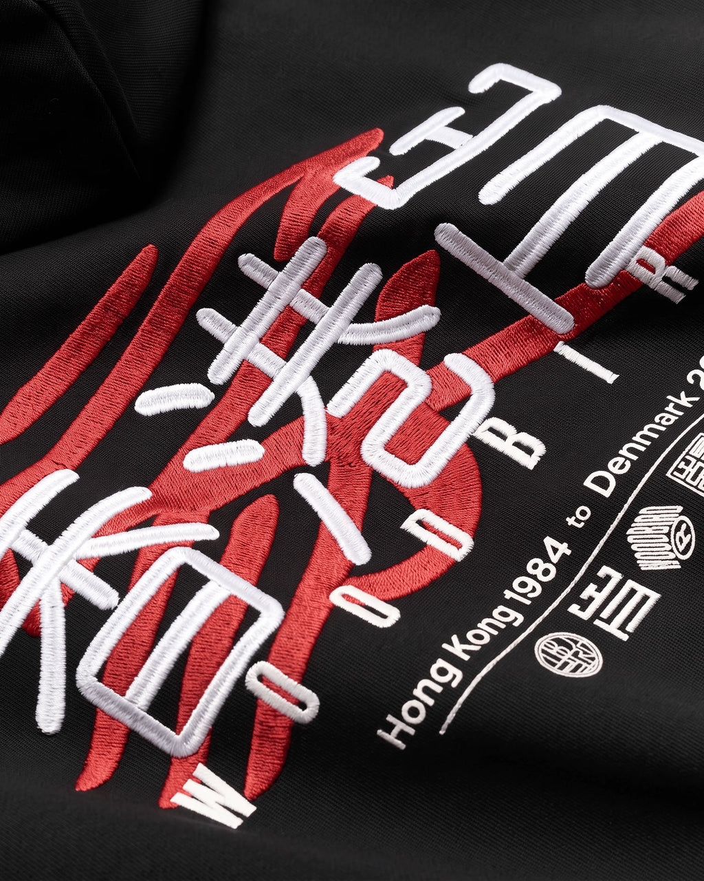 Sweat à capuche en coton avec graphisme et broderie