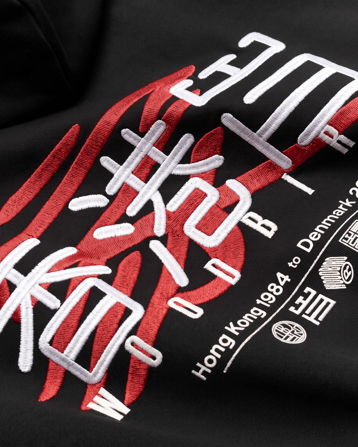 Sweat à capuche en coton avec graphisme et broderie