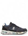 Sneakers Premiata Mase 7819 in pelle e tessuto blu scuro con suola bianca decorata, perfette per look casual invernali da uomo.