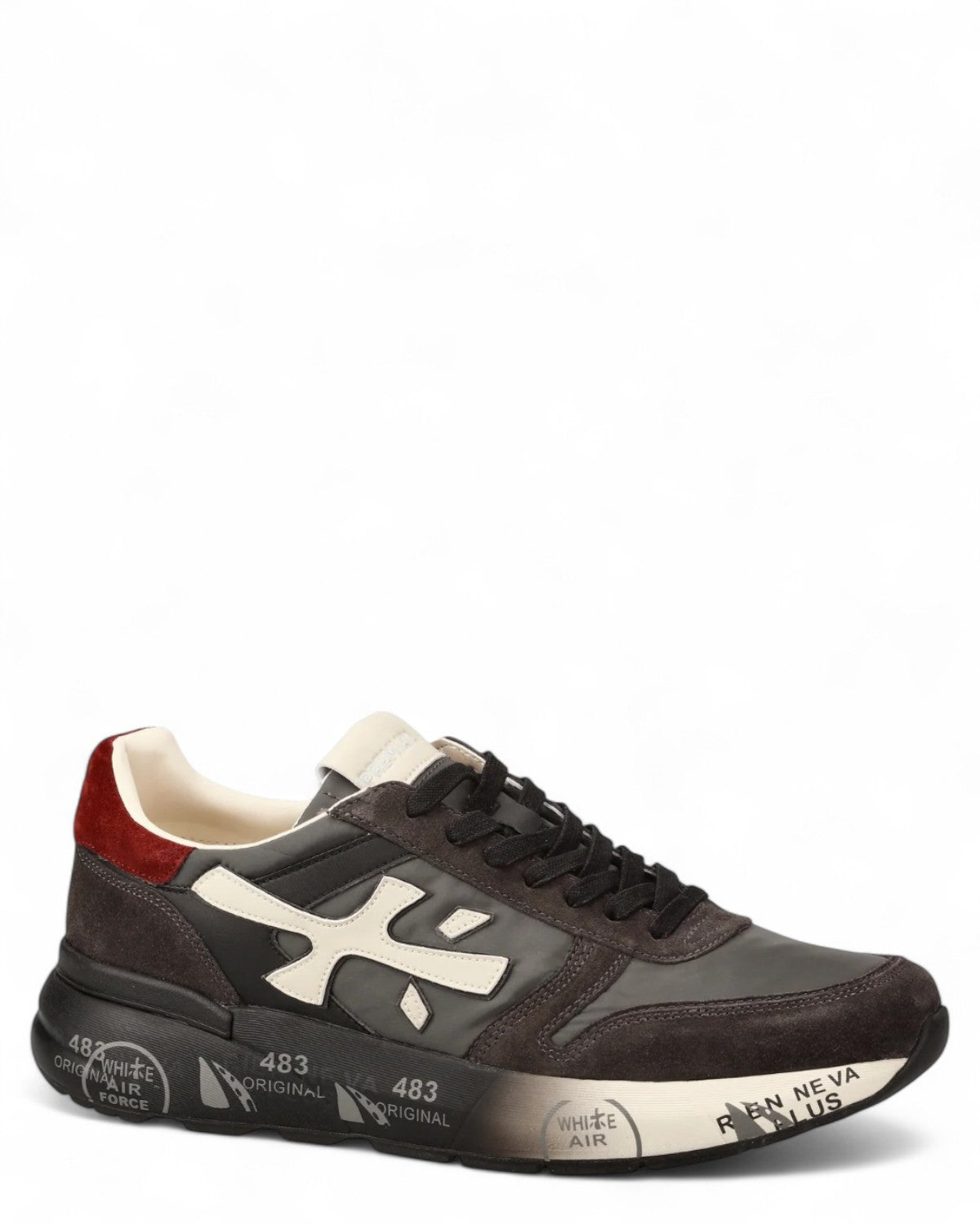 Sneakers Premiata Mick 7719 da uomo, design moderno con suola nera decorata e tomaia in pelle e camoscio. Ideali per outfit urban e versatili.