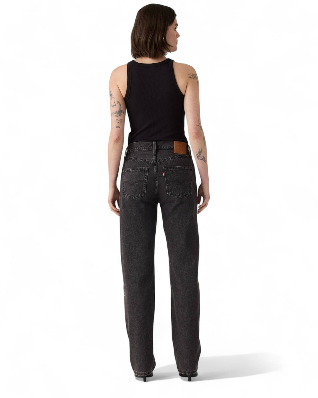 Retro dei jeans Levi's 501 Anni '90 con tasche posteriori classiche e patch in pelle, stile vintage e fit rilassato.