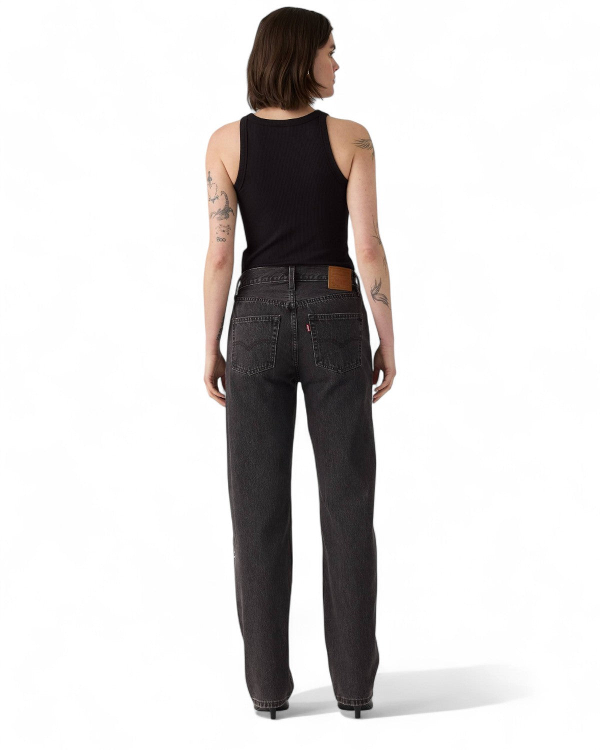 Retro dei jeans Levi's 501 Anni '90 con tasche posteriori classiche e patch in pelle, stile vintage e fit rilassato.