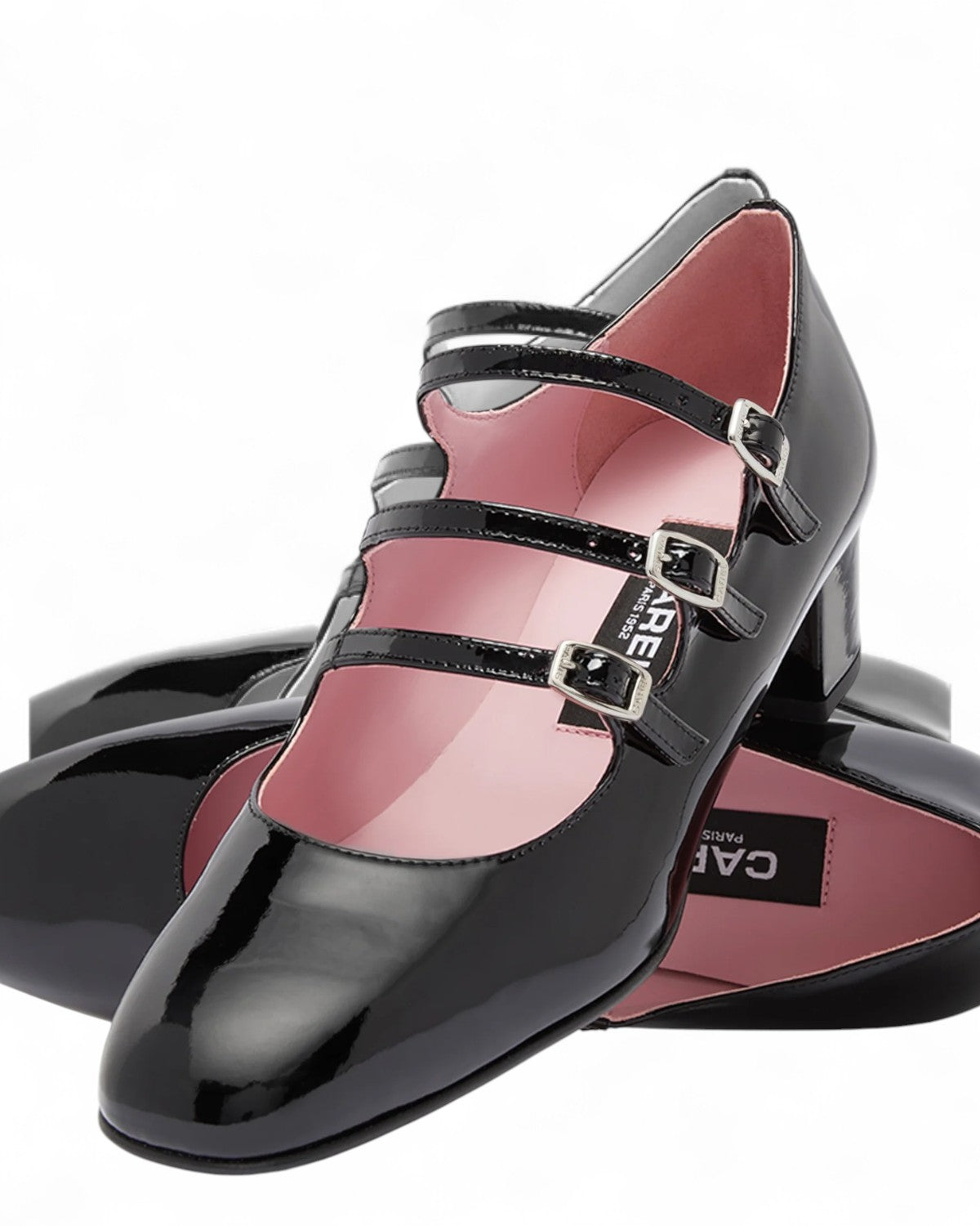 Pumps Carel Kina Mary Janes in vernice nera con interno rosa, design con tre cinturini e tacco basso ideali per outfit sofisticati.
